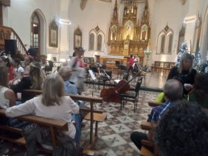 Voces y música llenaron el Templo del Carmen en el Concierto de Navidad